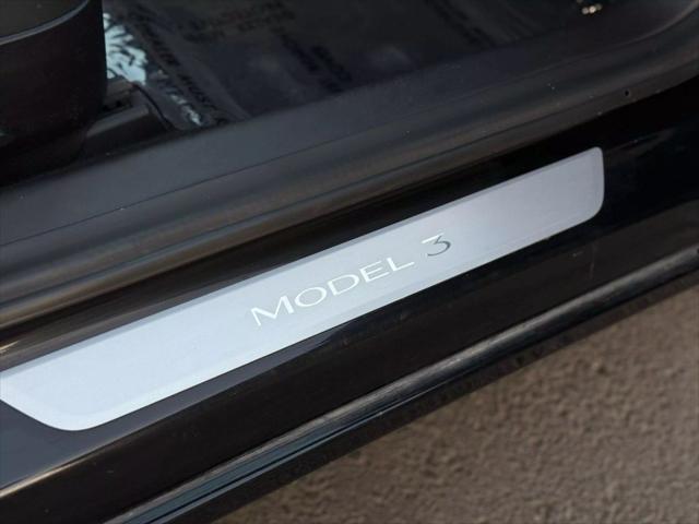 used 2018 Tesla Model 3 car, priced at $13,499