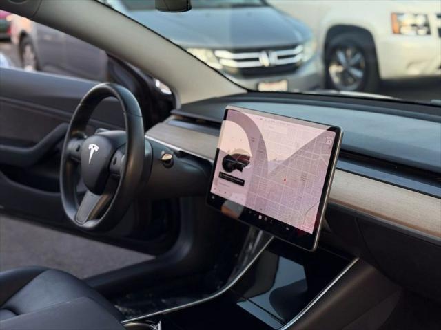 used 2018 Tesla Model 3 car, priced at $13,499