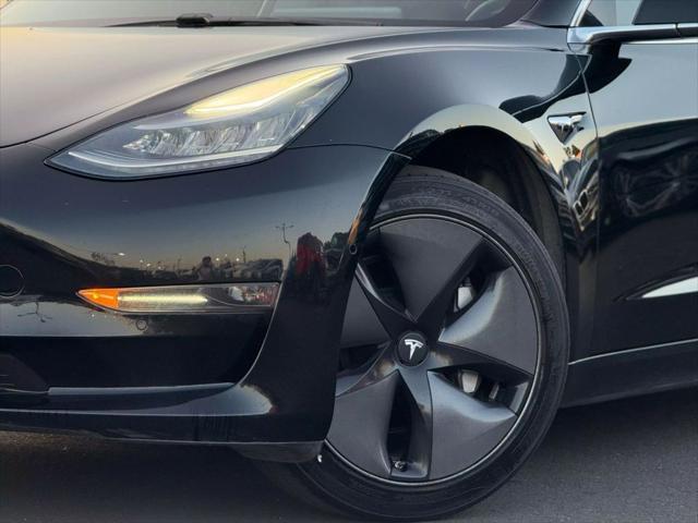 used 2018 Tesla Model 3 car, priced at $13,499