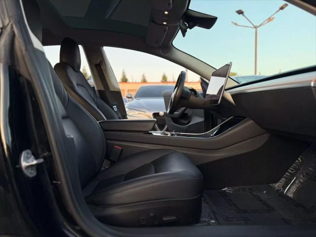 used 2018 Tesla Model 3 car, priced at $13,499