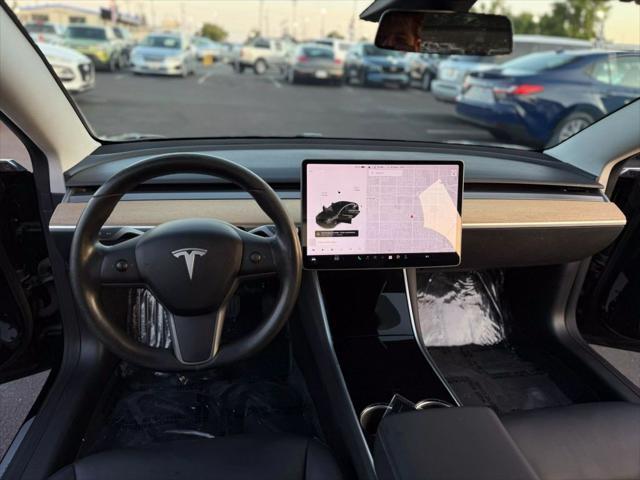 used 2018 Tesla Model 3 car, priced at $13,499