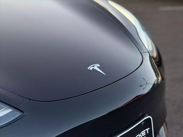 used 2018 Tesla Model 3 car, priced at $13,499