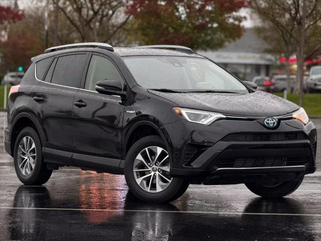 used 2018 Toyota RAV4 Hybrid car, priced at $19,999