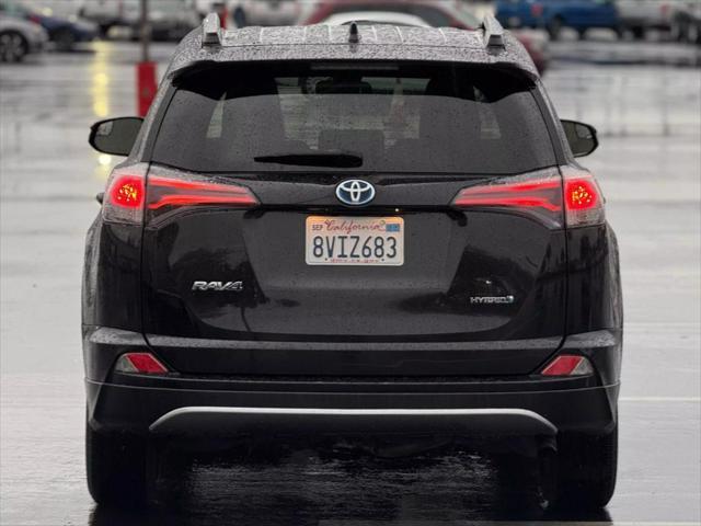 used 2018 Toyota RAV4 Hybrid car, priced at $19,999