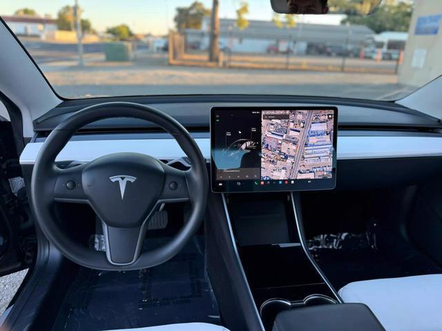 used 2018 Tesla Model 3 car, priced at $26,999