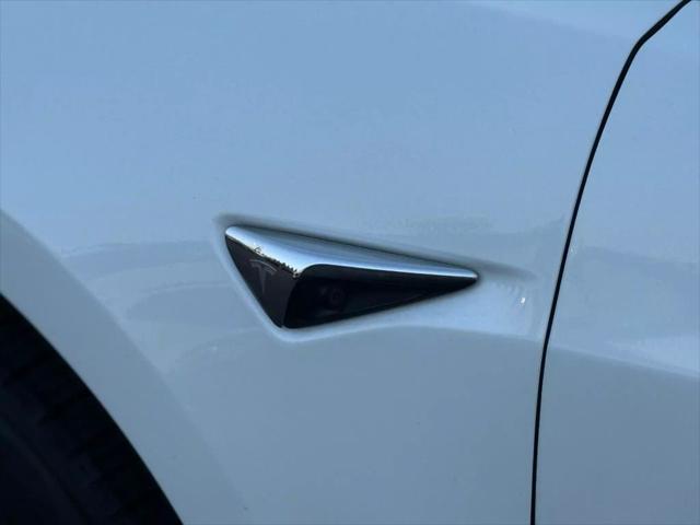 used 2017 Tesla Model 3 car, priced at $15,499