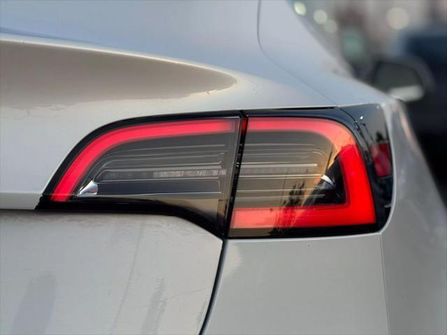 used 2017 Tesla Model 3 car, priced at $15,499