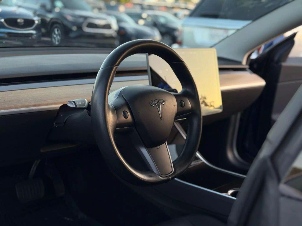 used 2018 Tesla Model 3 car, priced at $17,499