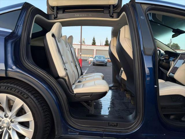 used 2018 Tesla Model X car, priced at $19,999
