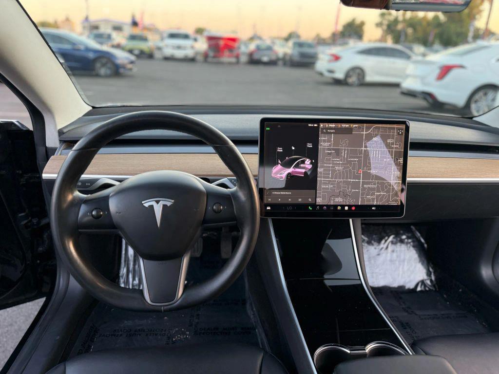 used 2018 Tesla Model 3 car, priced at $16,999