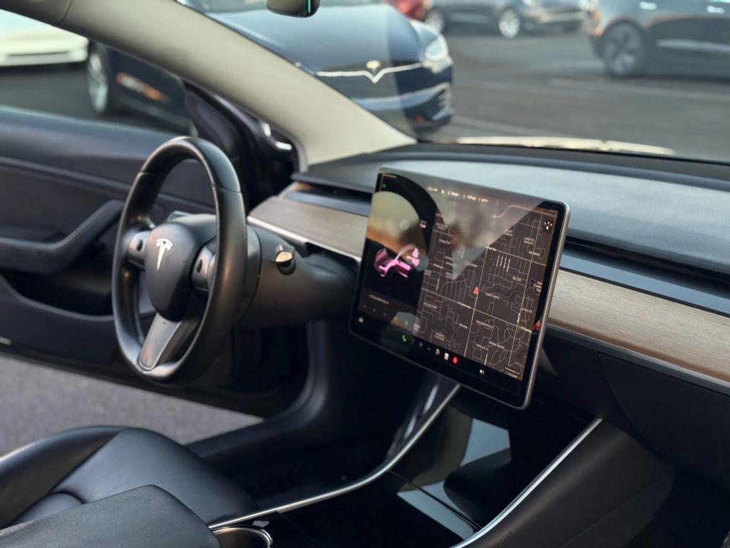 used 2018 Tesla Model 3 car, priced at $16,999