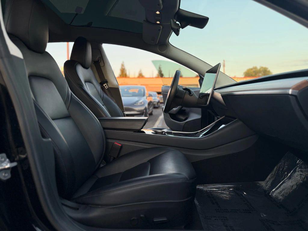used 2018 Tesla Model 3 car, priced at $16,999