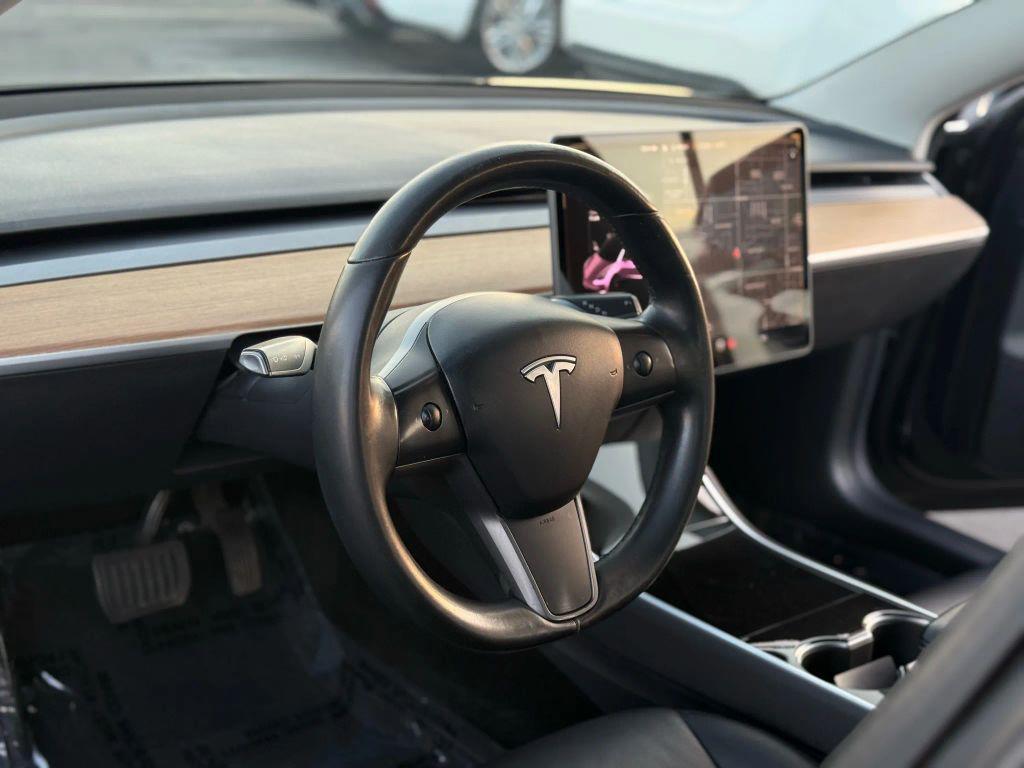 used 2018 Tesla Model 3 car, priced at $16,999