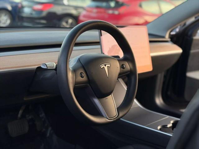 used 2020 Tesla Model 3 car, priced at $18,999