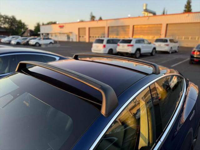 used 2018 Tesla Model 3 car, priced at $15,999