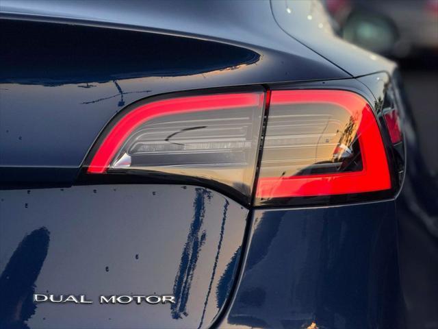 used 2018 Tesla Model 3 car, priced at $15,999