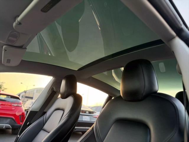 used 2018 Tesla Model 3 car, priced at $15,999