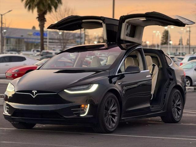 used 2018 Tesla Model X car, priced at $20,999