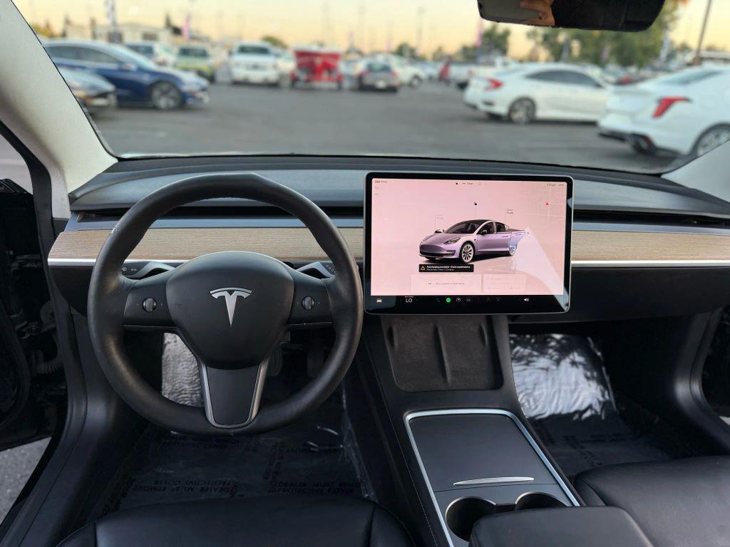 used 2022 Tesla Model 3 car, priced at $14,499