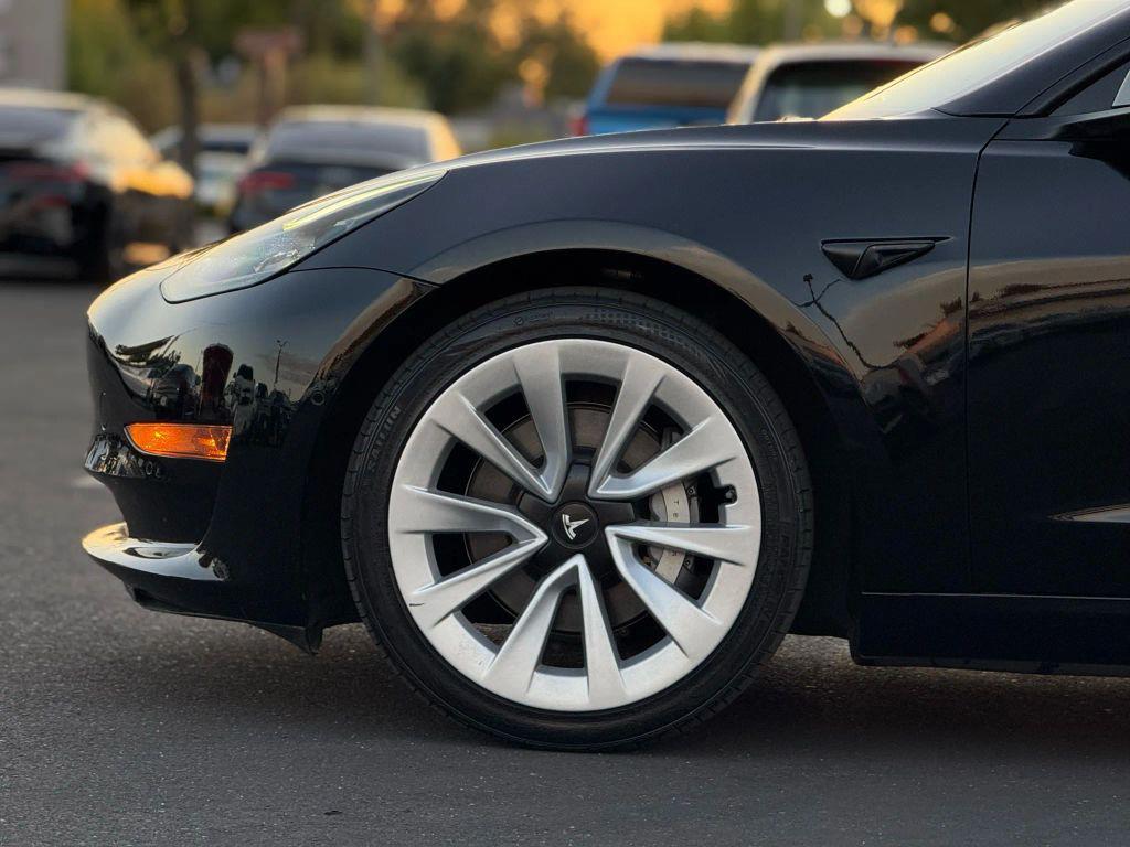 used 2022 Tesla Model 3 car, priced at $14,499
