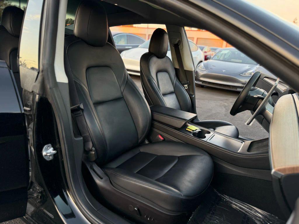 used 2022 Tesla Model 3 car, priced at $14,499