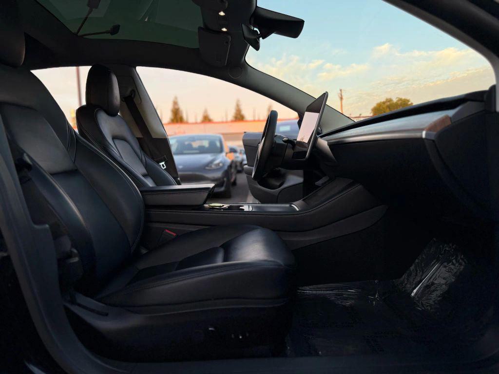 used 2022 Tesla Model 3 car, priced at $14,499