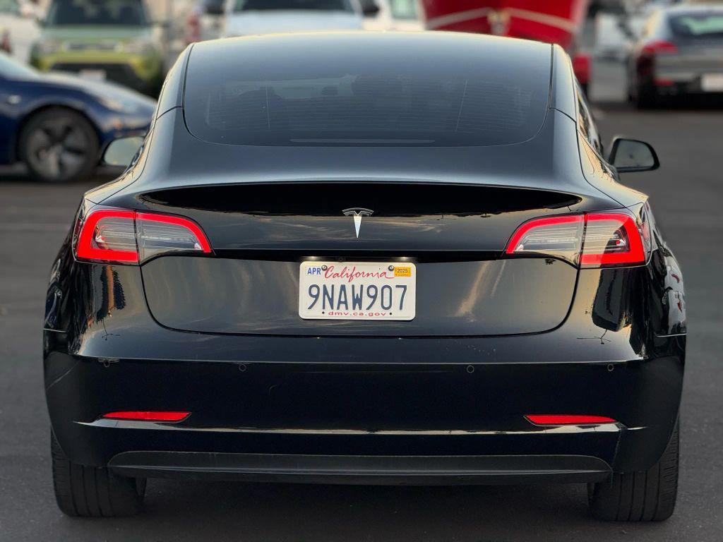 used 2022 Tesla Model 3 car, priced at $14,499