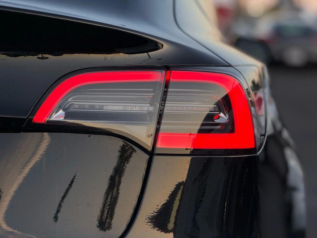 used 2022 Tesla Model 3 car, priced at $14,499