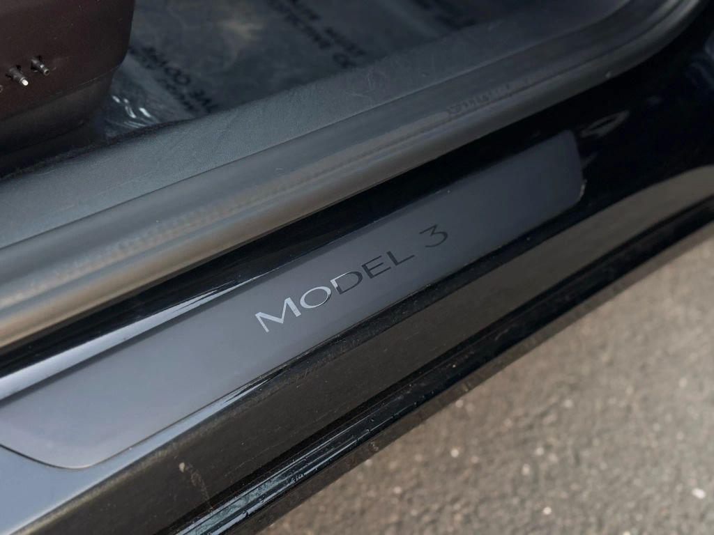 used 2022 Tesla Model 3 car, priced at $14,499
