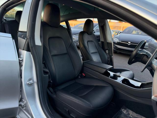 used 2018 Tesla Model 3 car, priced at $26,499