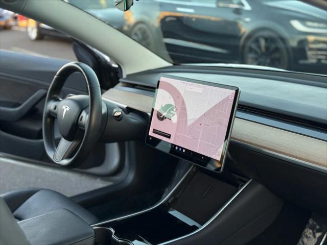 used 2018 Tesla Model 3 car, priced at $26,499