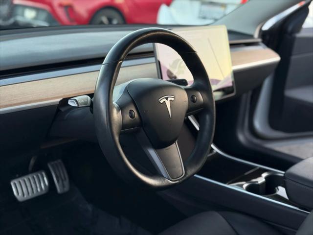 used 2018 Tesla Model 3 car, priced at $26,499