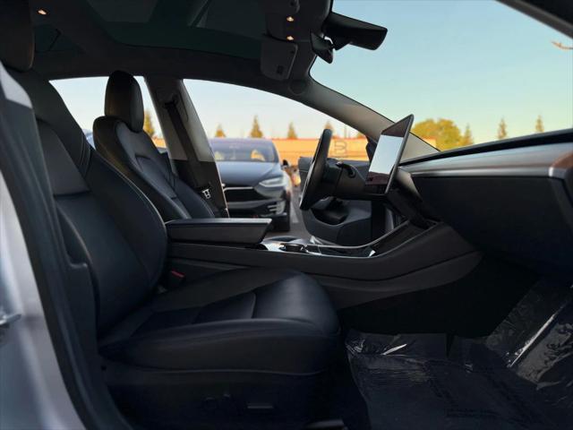 used 2018 Tesla Model 3 car, priced at $26,499