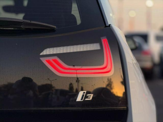 used 2014 BMW i3 car, priced at $6,299