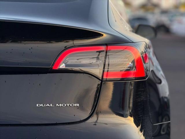 used 2018 Tesla Model 3 car, priced at $15,499