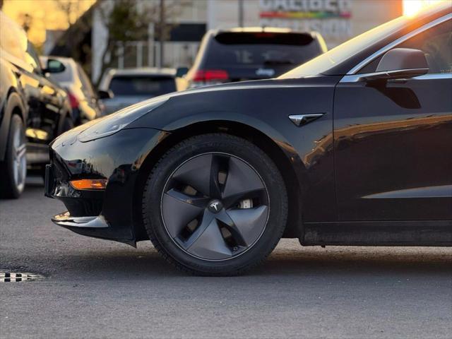 used 2018 Tesla Model 3 car, priced at $15,499