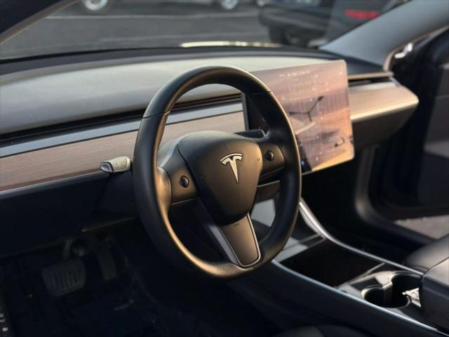 used 2018 Tesla Model 3 car, priced at $15,499