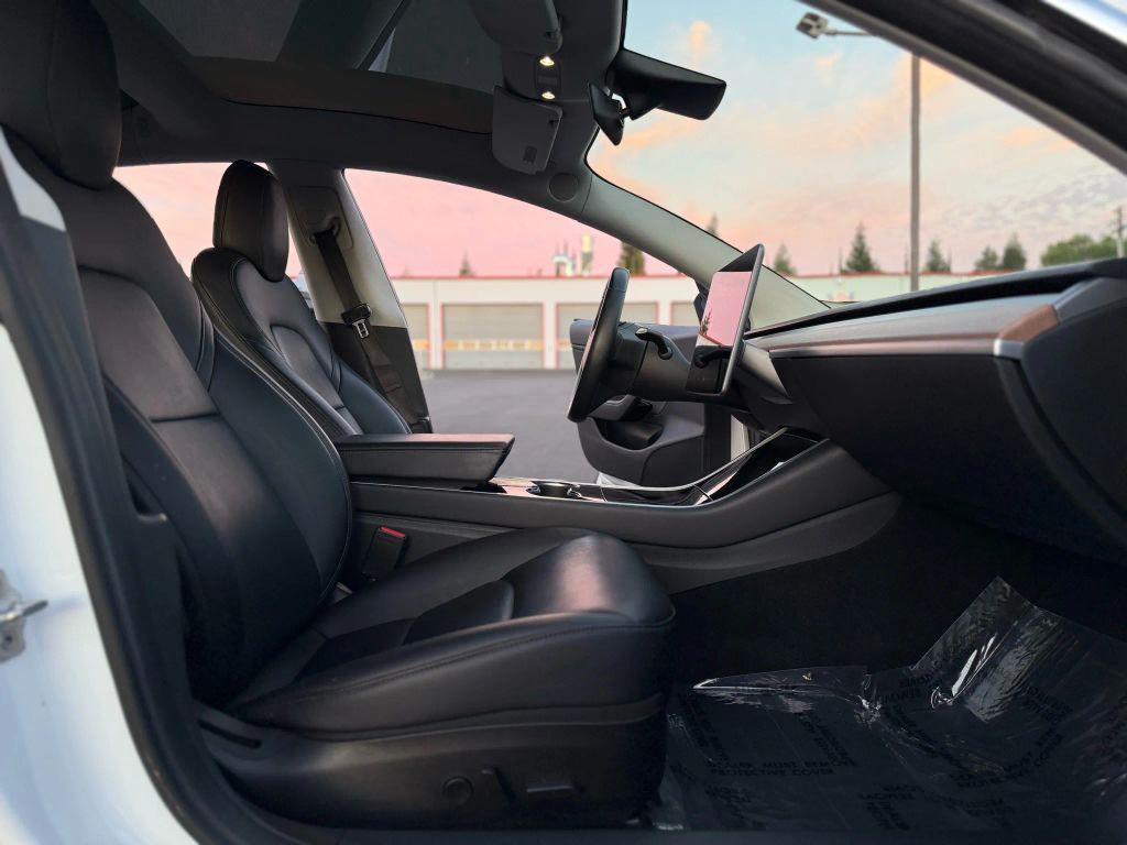 used 2018 Tesla Model 3 car, priced at $13,499