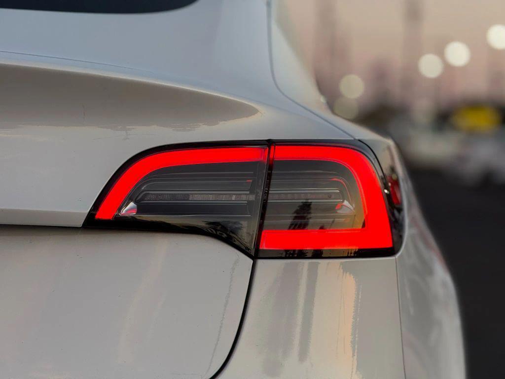 used 2018 Tesla Model 3 car, priced at $13,499