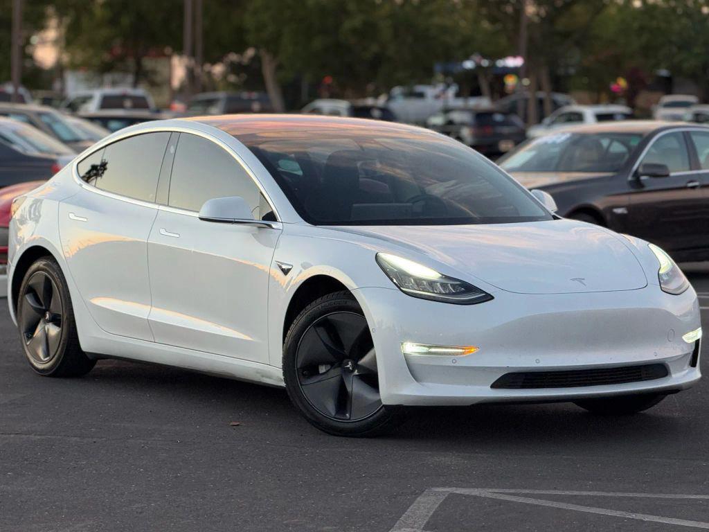 used 2018 Tesla Model 3 car, priced at $13,499