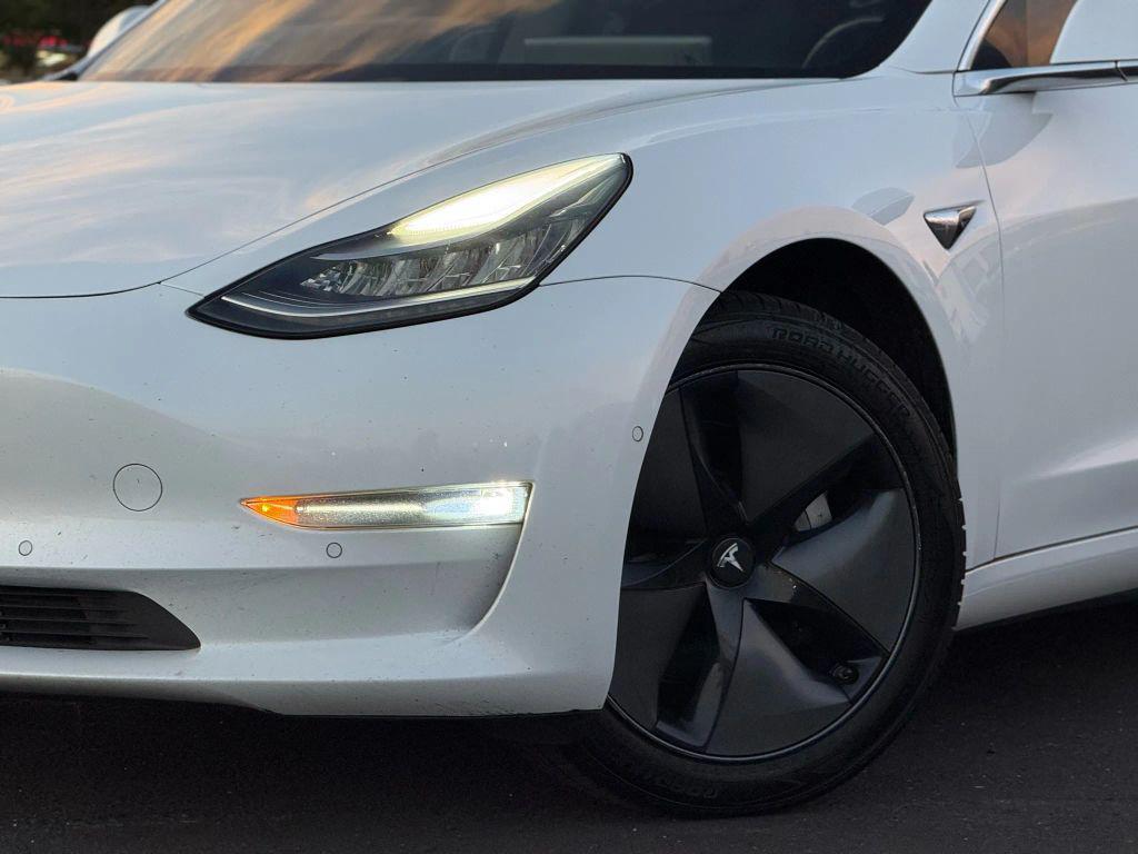 used 2018 Tesla Model 3 car, priced at $13,499