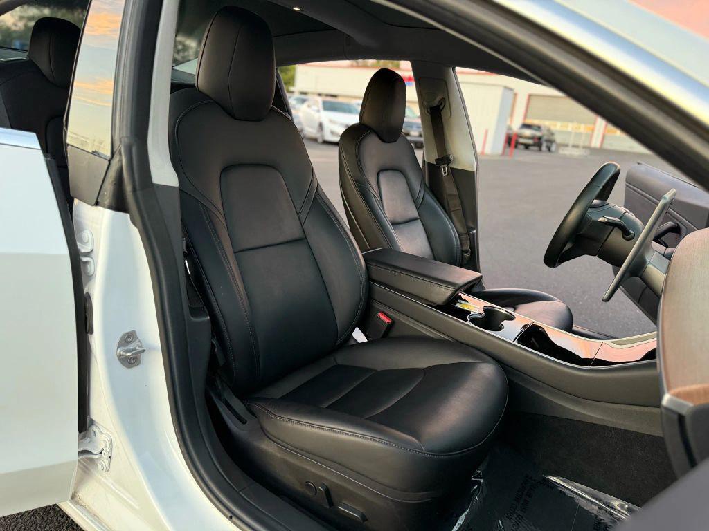 used 2018 Tesla Model 3 car, priced at $13,499