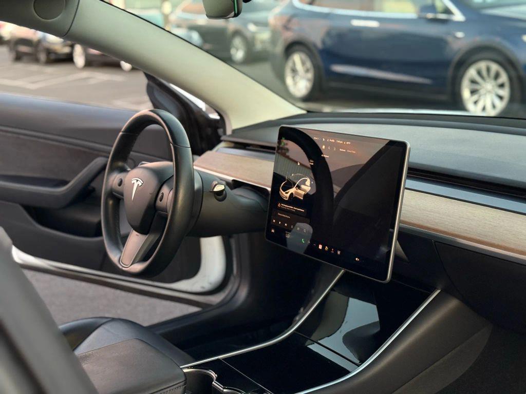 used 2018 Tesla Model 3 car, priced at $13,499