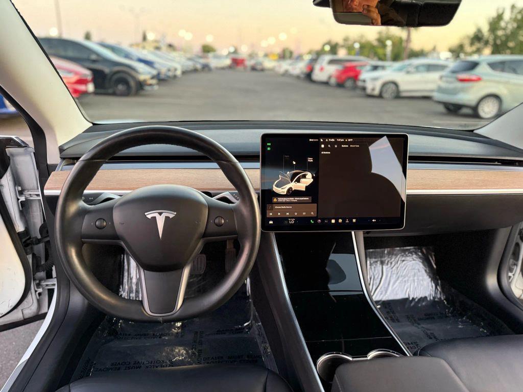 used 2018 Tesla Model 3 car, priced at $13,499