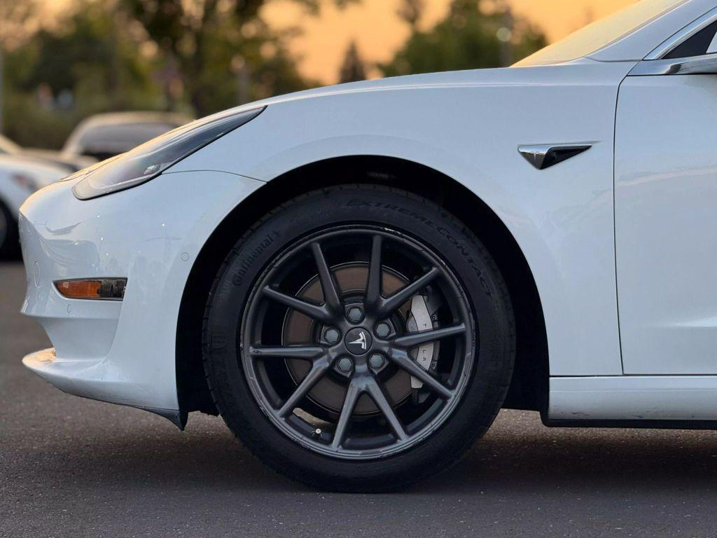used 2018 Tesla Model 3 car, priced at $18,999