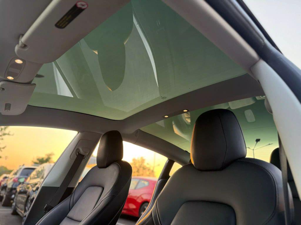 used 2018 Tesla Model 3 car, priced at $18,999