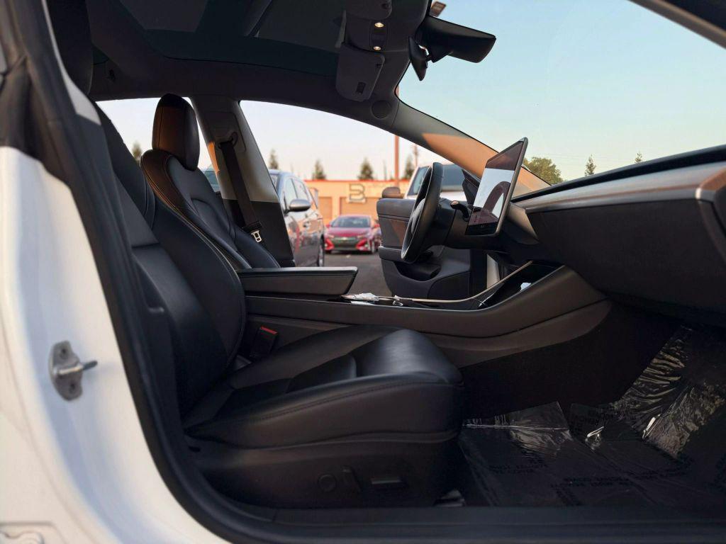 used 2018 Tesla Model 3 car, priced at $18,999