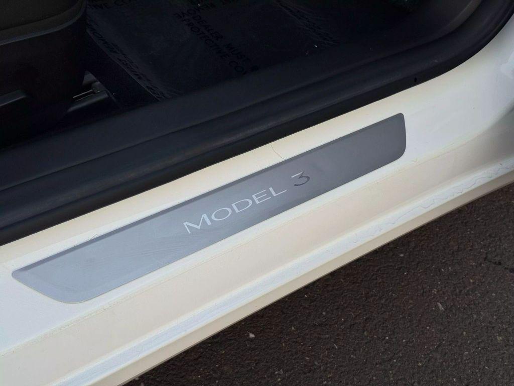 used 2018 Tesla Model 3 car, priced at $18,999