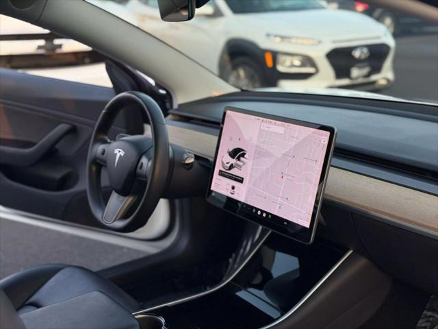 used 2018 Tesla Model 3 car, priced at $18,999