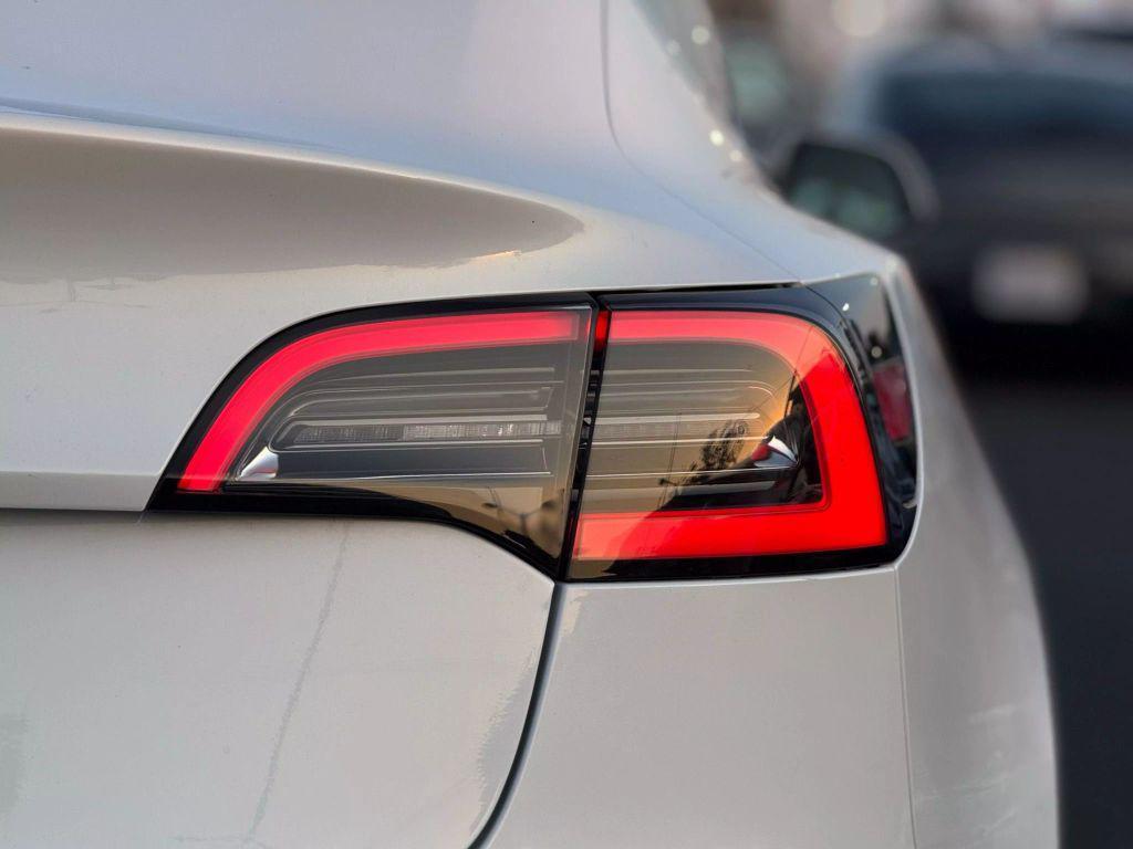 used 2018 Tesla Model 3 car, priced at $18,999